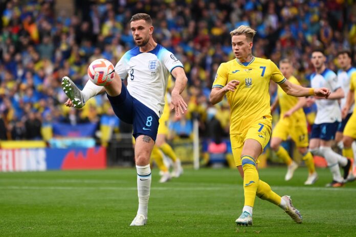 England players celebrating a crucial victory over Ukraine in an important international football match